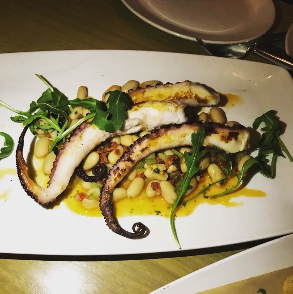Enjoy three plump, juicy octopus tentacles that have been prepared to perfection. The octopus is complemented with cannelini beans and chorizo bits, and seasoned with chili and lemon.