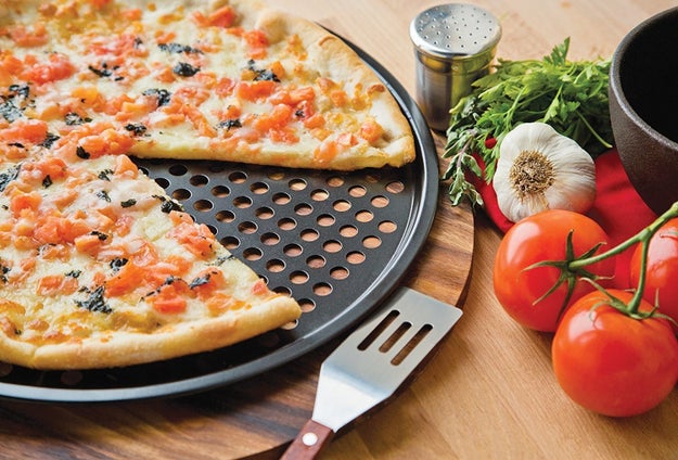 A perforated crisping pan, because you deserve reheated, frozen, and homemade pizza with an actually CRUNCHY (never soggy) crust. And it works on anything that needs to be crisped up in the oven!