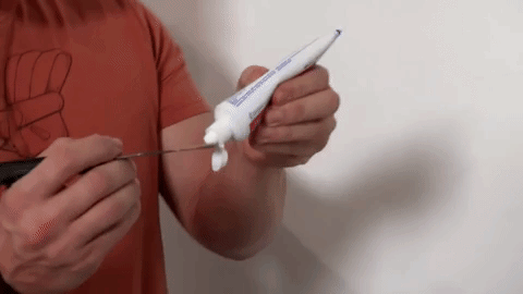 Small holes like nail holes in walls can easily be filled with plain white toothpaste. Just add toothpaste, let dry, and if needed sand and paint over. On white walls, no sanding or painting is usually even needed.—briannao3From here.