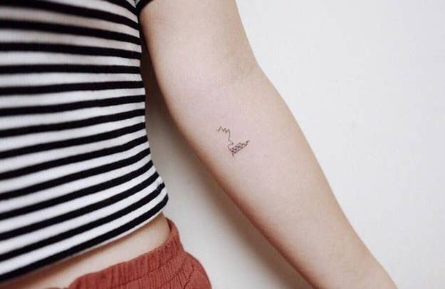 Minimalist Sydney Opera House Tattoo - elegant arts tattoo