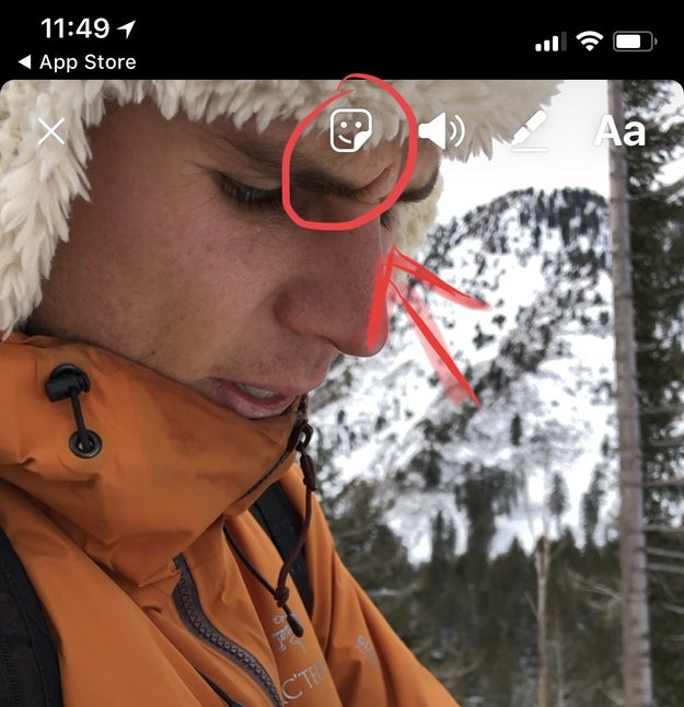 After selecting a photo or video to add to your Story, tap the Stickers icon.