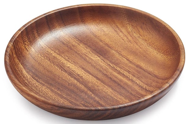 A handcrafted platter made from acacia wood that looks way more expensive than it really is.