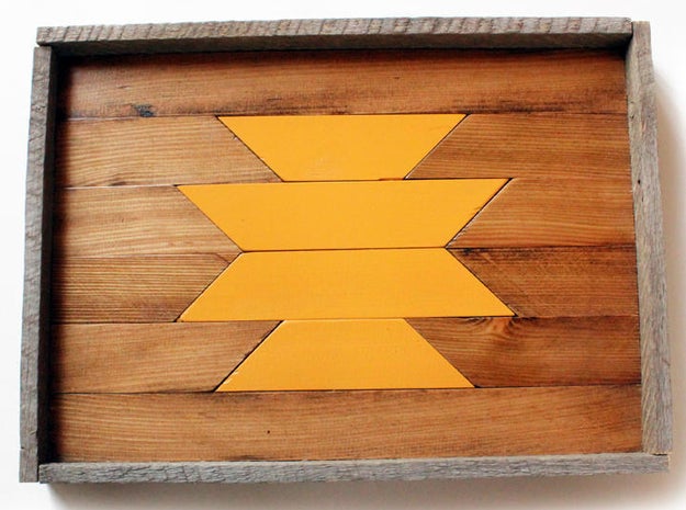 A handmade, water-resistant serving tray crafted from reclaimed wood.