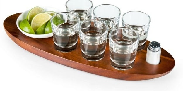 A high-quality shot glass tray, since you're not in college anymore and your guests deserve to celebrate like adults.