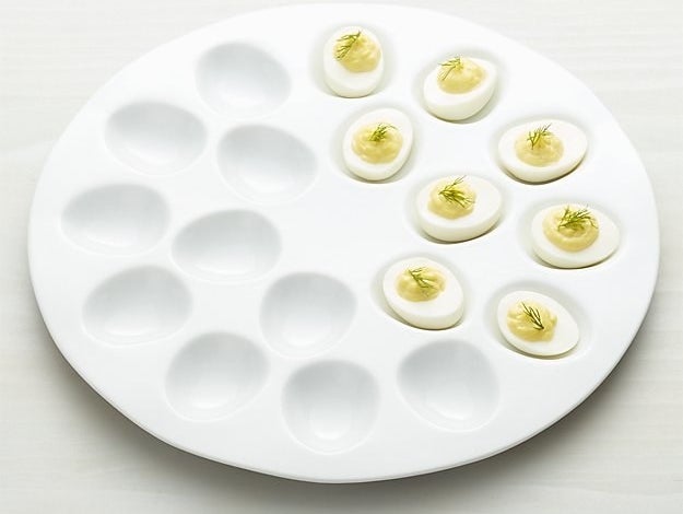 A ceramic platter with grooves for easy serving, because deviled eggs are awesome and you can't tell me otherwise.