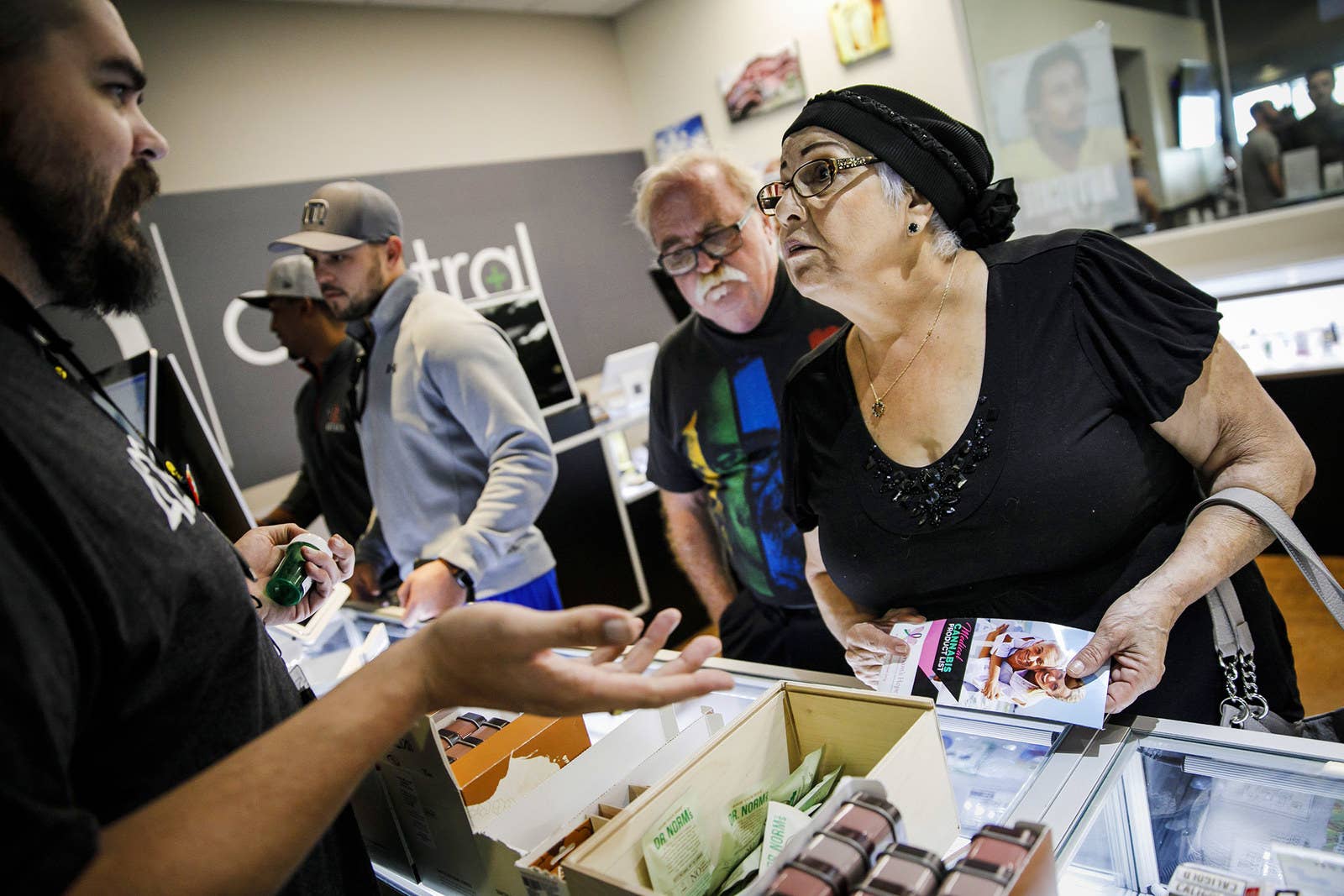 Bob and Judy Malgeri discuss their purchase options with Maxwell Robinson at 420 Central on Jan. 1.