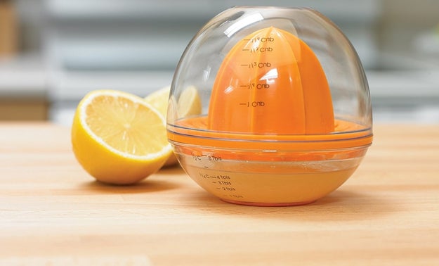 A citrus juicer with a built-in storage container and measuring cup lid so you never have to waste a whole lemon to get a tablespoon of juice. Or try to squeeze it straight into a measuring spoon. OR squeeze it into a bowl and THEN pour it into a measuring spoon. Basically all of that's over.