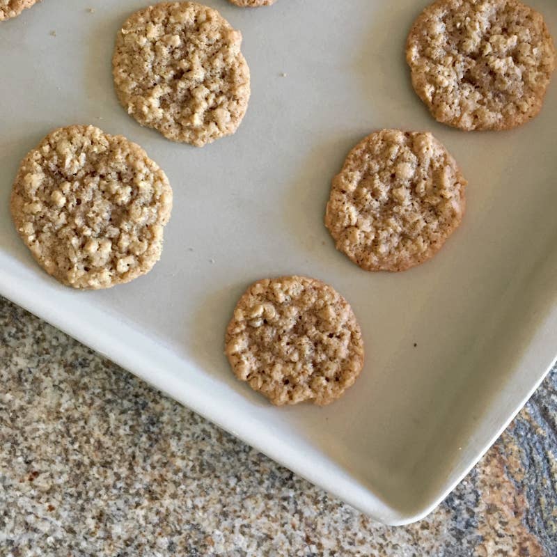 I've been using this baking pan for 11 or 12 years now â ever since I was a teen making batches of chocolate chip cookies â and I still don't like to bake cookies on anything else. I swear that cookies bake more evenly and consistently on it than any other pan, the cookie bottoms NEVER burn (unless you *really* over cook them, then yeah, burning might happen), and it's always easy to get the cookies off once they're done with their first short cool. It doesn't have a nonstick coating, but rather builds up ~seasoning~ as you cook over time, much like a cast-iron skillet. That seasoning lets you skip the layer of parchment paper, so you use less of that. Also like a cast-iron, you don't clean it with dish soap: It comes with a little plastic scraper, and you simply run the pan under hot water and scrape off all the excess crumbs. I even use it to roast chopped veggies, or make a veggies-and-chicken sheet pan dinner. One small warning: If you don't spread the food evenly over the sheet per the directions (i.e., try to do what I did and roast two halves of a big spaghetti squash right in the center of the pan) the temperature difference between the cooler part of the pan (under the squash) and the rest of the pan as it heats up in the oven will make the pan crack in half! But that wasn't a deal breaker for me, and I definitely got another one â I have other pans that'll happily roast my spaghetti squash, like the cast-iron skillet â but I need the bar pan for cookies! âNatalie BrownGet it from Pampered Chef for $37.