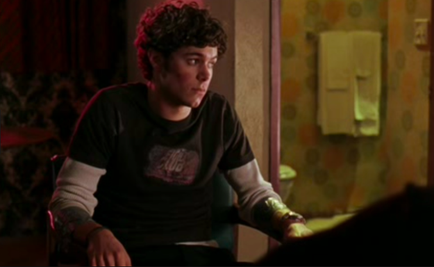 Adam Brody wears a Fight Club shirt in Mr. and Mrs. Smith.