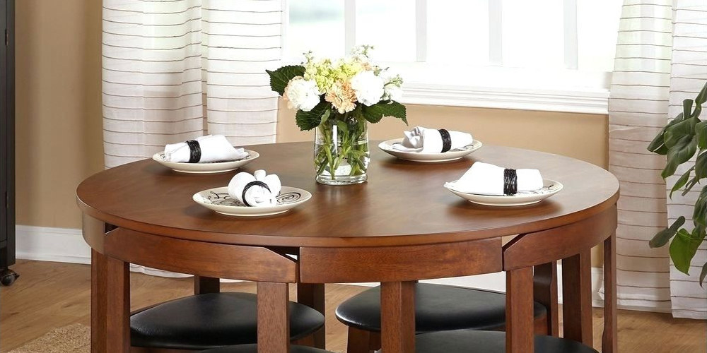 If you are less in space for your dining room, make sure you decorate it in a minimal way without compromising on the comfort and use of the room. Your furniture, color, decors…everything matters. Adding more decors makes the room congested and uneasy. Keeping the overall design of the room minimal will make your room look more spacious and lively.It would be great if you go on with modern abstract indoor designs and furniture.