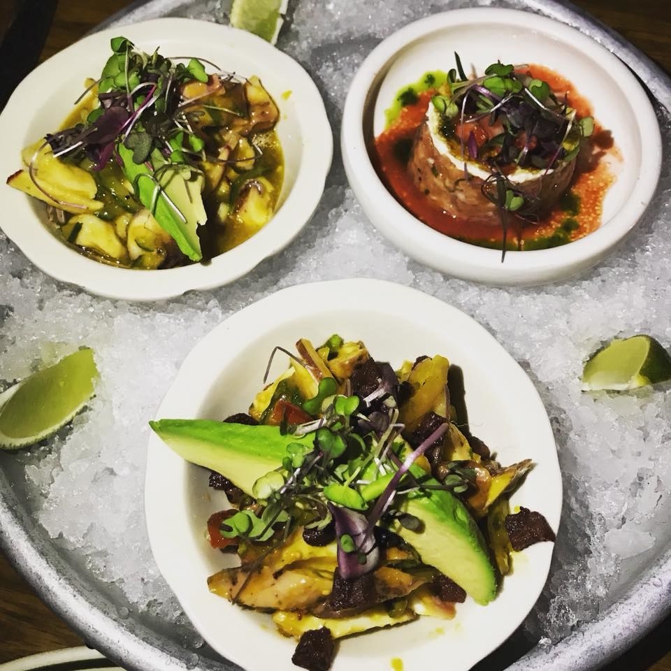 Sample a trio of all the fantastic ceviches with the Crudo Tasting. The shareable appetizer includes Ceviche Mixto (bay scallops, octopus, squid, cucumber, avocado, cilantro, aji amarillo leche de tigre), Escabeche De Pulpo (Octopus, chorizo colorado, scallions, capers, cilantro, grape tomatoes, chipotle hummus), and the fan-favorite El Salmon Brulee (Verlasso Salmon tartar, fromage brulee, strawberry & ginger leche de tigre, micro bull blood green).