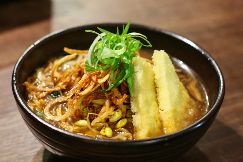 Vegans - rejoice! You can experience the deliciousness of Mokbar with the Vegan "Doengjanjjigae" Miso. The broth is made out of kombu doenjang soybean broth reminiscent of rich miso soup. Lightly fried tofu, spinach, bean sprouts, scallions, shiitake mushrooms, and crispy potatoes complete the dish.