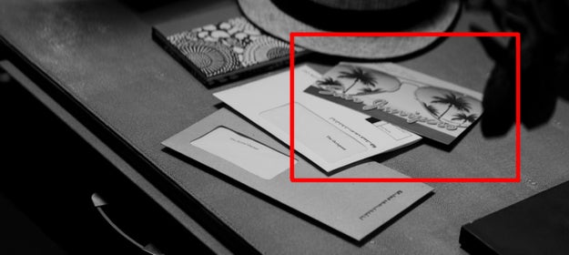 The desk Bella rummages through has a 