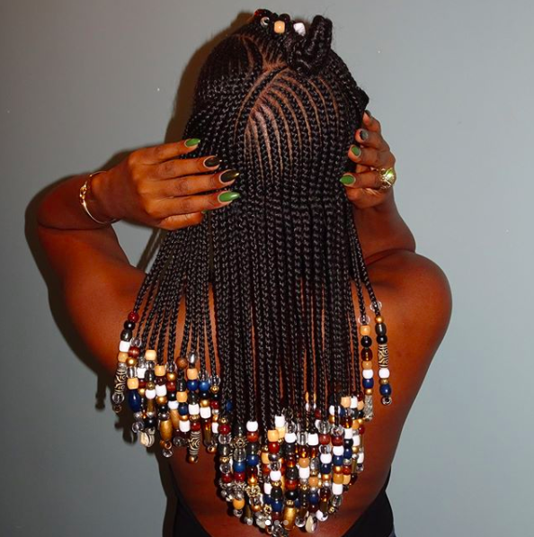 It has taken on many variations as black women all over the globe have adopted the style, but there are some common characteristics, like bead accents, that've remained popular.