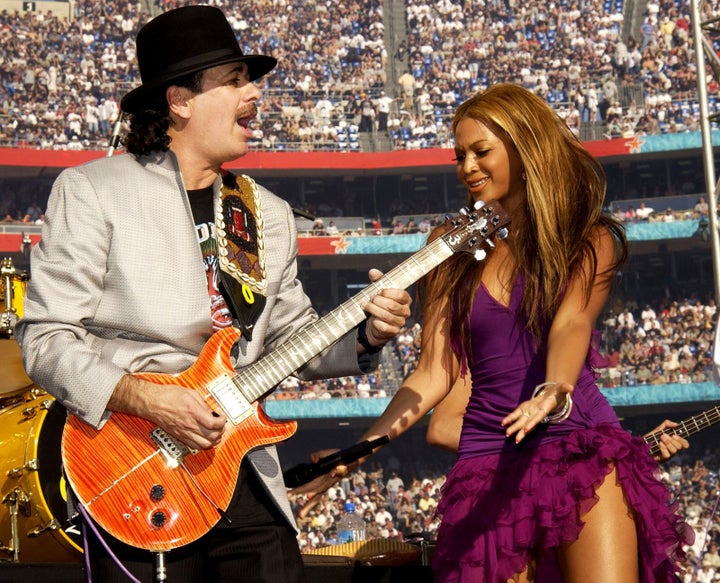 Jan. 26, 2003 — Carlos Santana and Beyonce at Super Bowl XXXVII in San Diego