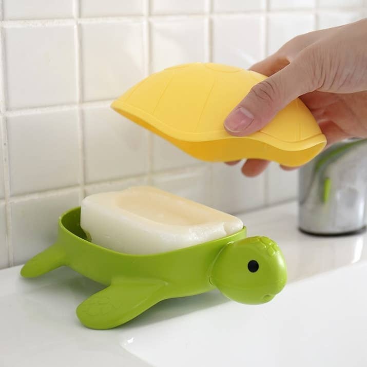 Promising review: "Cool soap dish. A little big but I like it. It has kept my soap dry in the shower and its tail drains out the excess water to keep my bar from getting slimy." —Daniel RiveraGet it from Amazon for $7.47+ (also available in white).