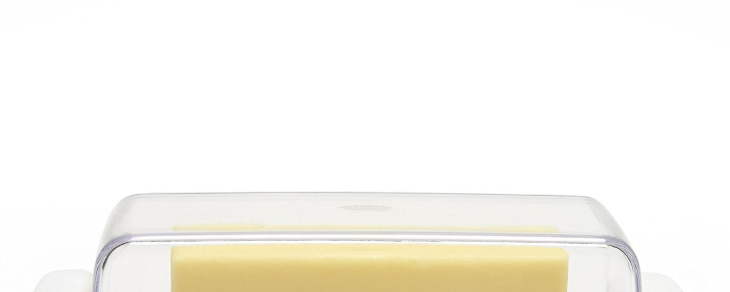 Has stoppers to keep butter in place while cutting, tablespoon measurement markings, and a clear lid that won't slide off during transport and is easy to remove.Promising review: "Stick of butter fits perfectly. Rubber on bottom keeps it from sliding around. Straight sides are easy to grip. Flat top lets you place a butter knife their. Top doesn't slide around. And you can put it in the dishwasher. I can't think of a thing I would change." —Dave PGet it from Amazon for $9.99 (also available for wide butter/cream cheese) or Jet for $9.99.