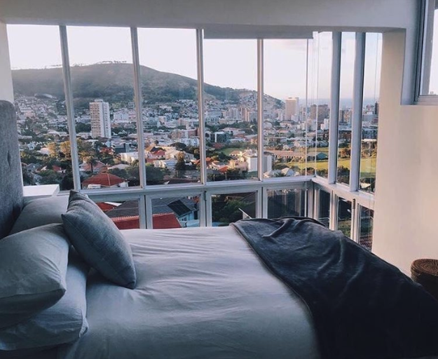 First, there's this airy Penthouse in Cape Town, South Africa, currently listed for $171 per night: