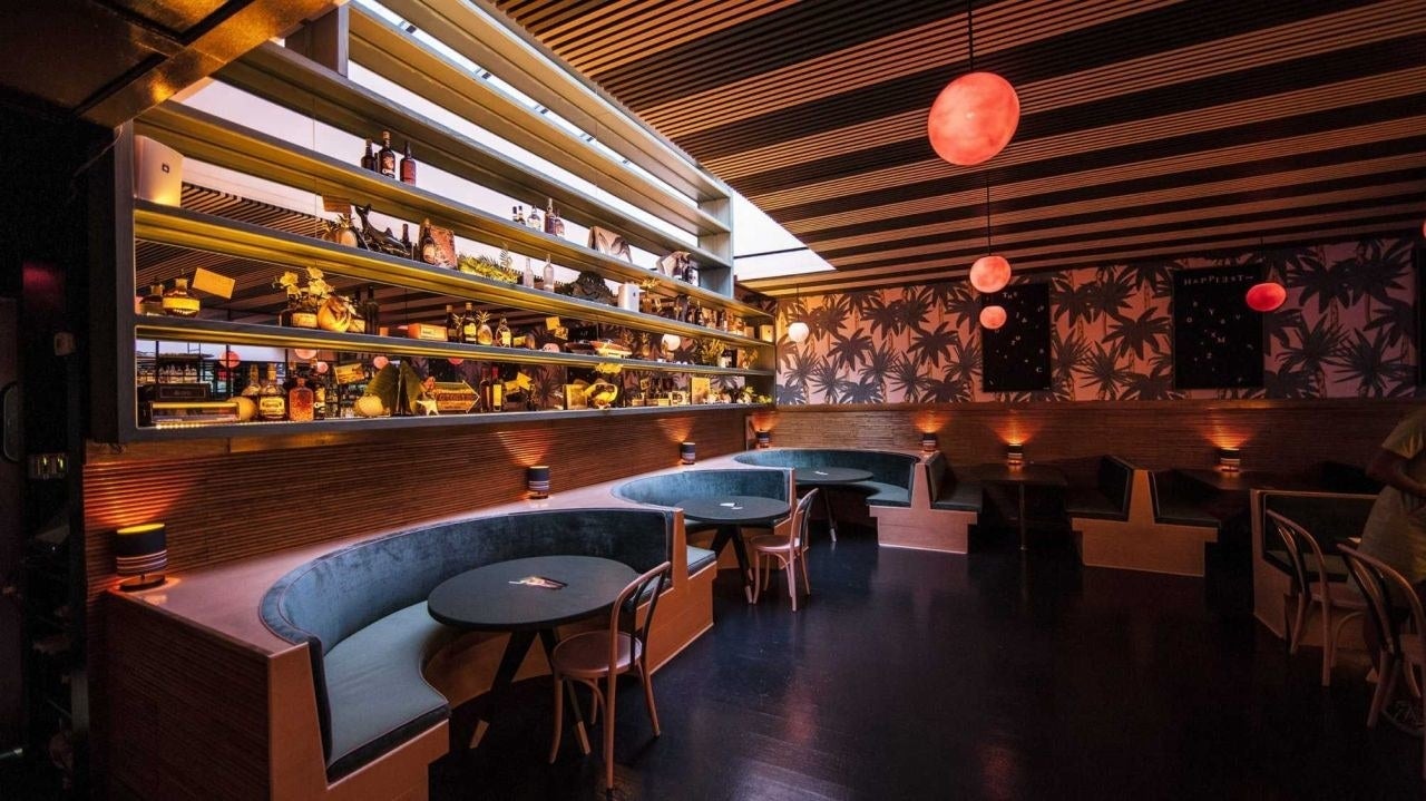 Tucked away in the heart of West Village, The Happiest Hour is a whimsical cocktail bar & restaurant that evokes a laid-back, beach-y California and Florida resorts vibe with walls decorated with palm trees. Guests can enjoy diner-style, shareable bites while sipping on innovative cocktails.