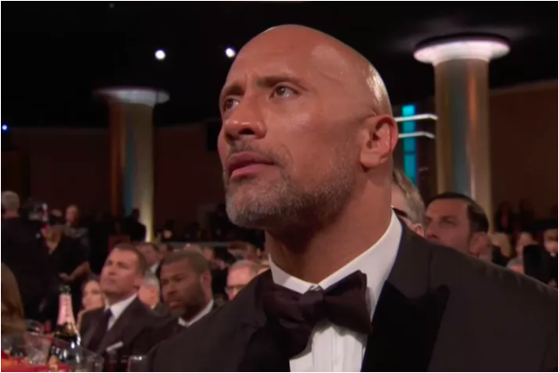 Bannon pointed out Dwayne "the Rock" Johnson, when the camera panned to him watching Oprah's speech. "He's ruined his career," Bannon said, according to Green. "If you rolled out a guillotine, they'd chop off every set of balls in the room."