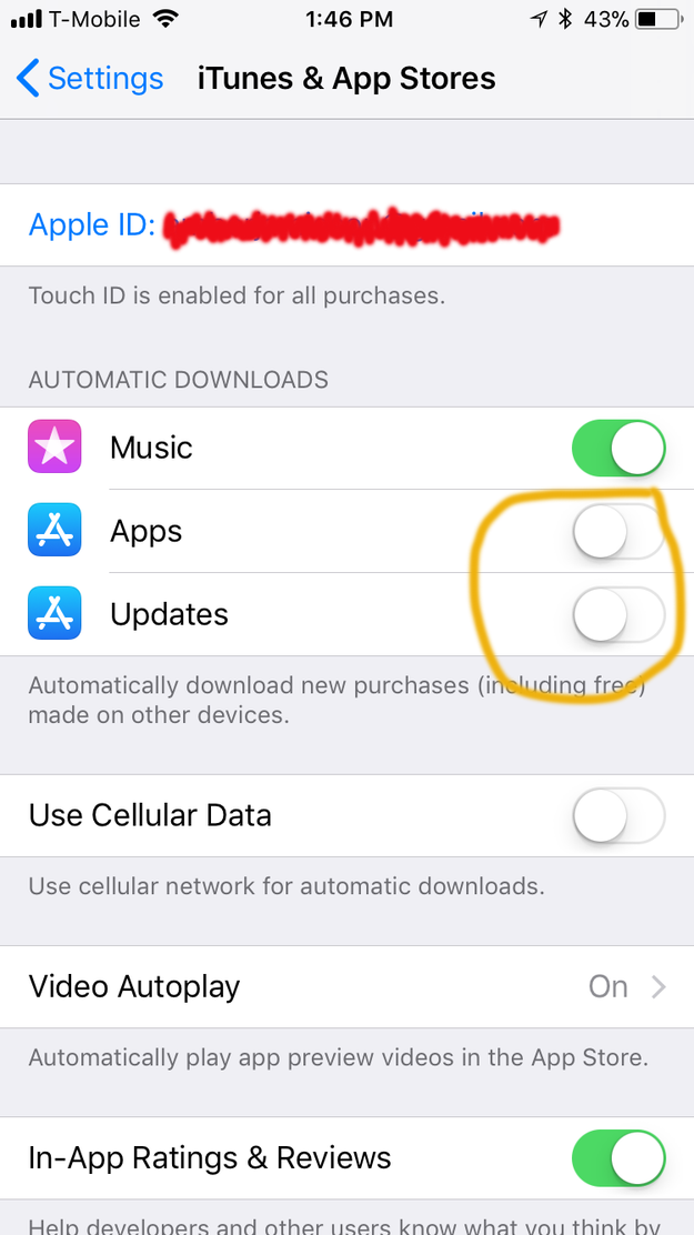 2. Open your phone's settings, go to iTunes and App Stores and turn off the "automatic downloads" for Apps and Updates.