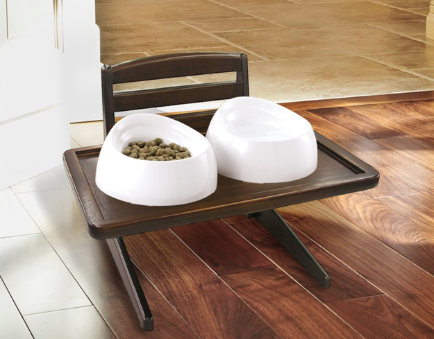 A doggy dining tray in a mahogany finish so your pup can eat like the sophisticated family member he really is.