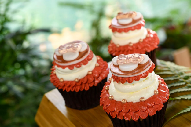 This island-inspired Rose Gold Vanilla Cupcake with guava pastry cream.