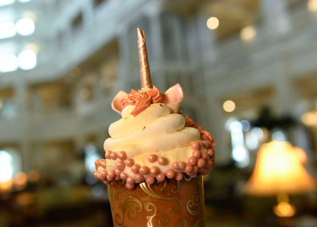 This extra-magical treat: a Rose Gold Unicorn Cupcake with rose gold sponge and hazelnut-cream cheese filling.