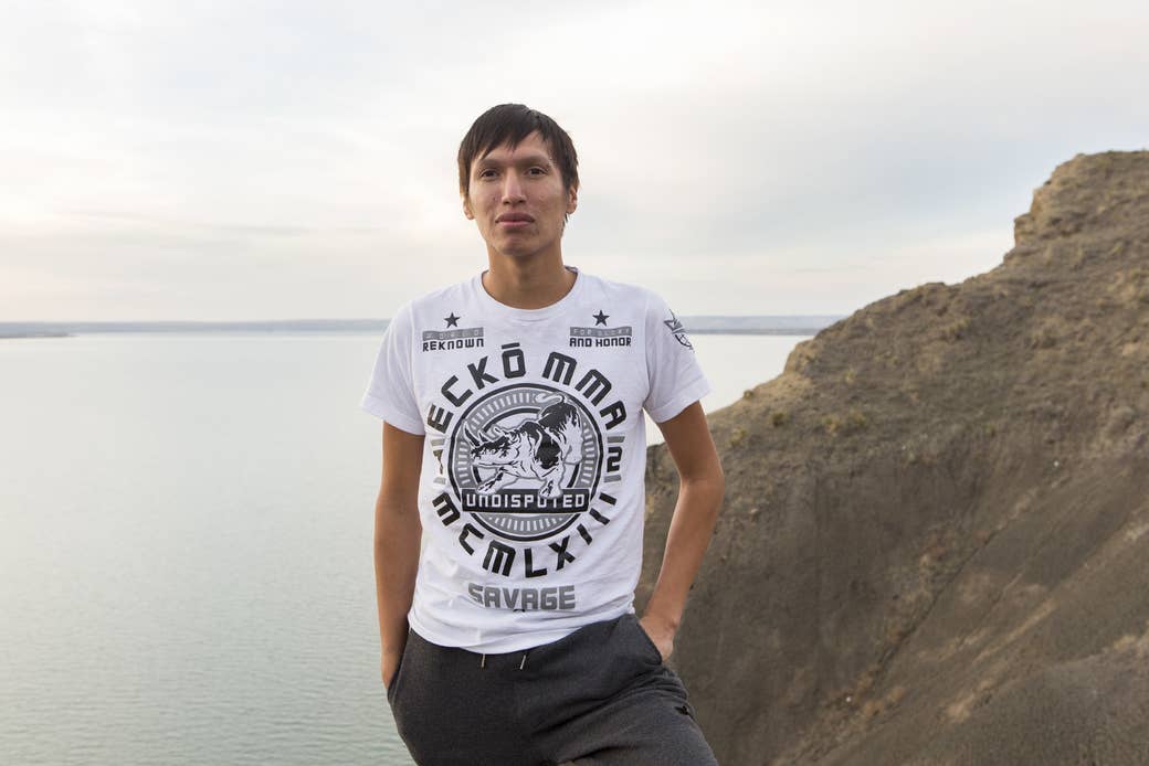 Danny Grassrope stands on a bluff overlooking the Missouri River on the Lower Brule Reservation in South Dakota.
