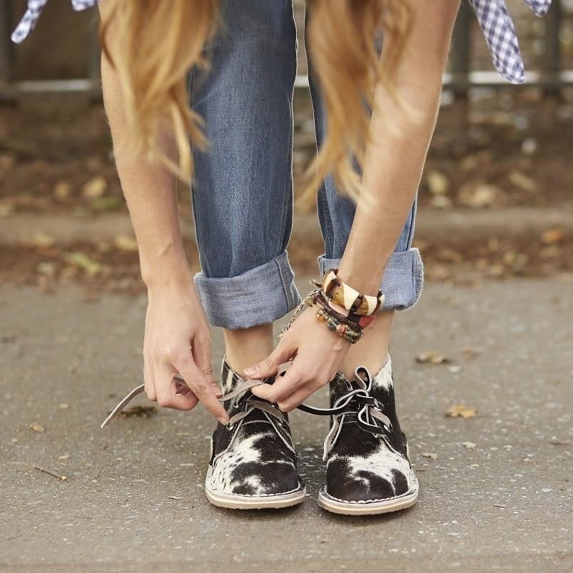 Put your best foot forward on any date with stylish shoes that don’t lack substance. UWEZO offer styles for him and her that are consciously-made with the purpose of empowering others through fashion and scholarship funds. With each dollar you spend, you help to support vulnerable children in Africa through our partner charity, Empower African Children.