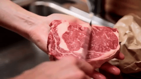 Simply scrape off any "visible discoloration" and debris with a knife, rinse it in tap water, then dry it off with a paper towel. (Note: This is a good way to "refresh" any steaks you have sitting in your fridge, but it won't magically make a spoiled one better — so use your judgement!) Check out the whole video here.