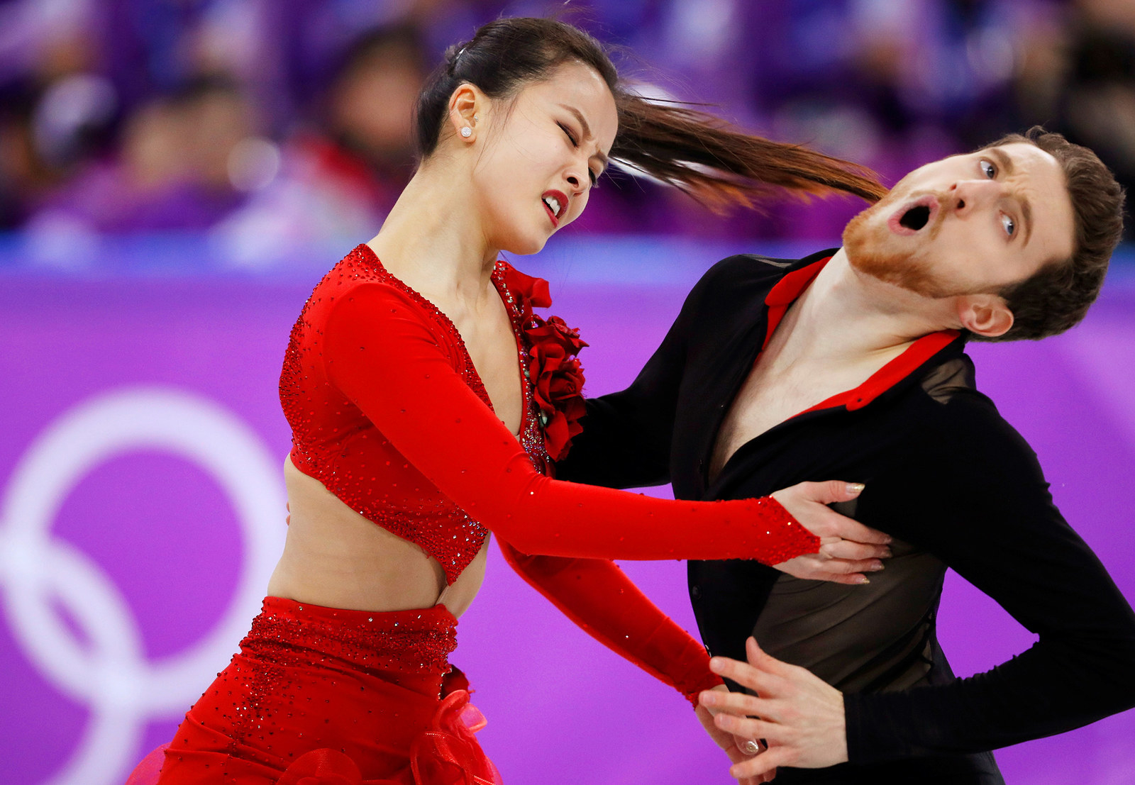 Yura Min and Alexander Gamelin of South Korea perform during the ice dance ...