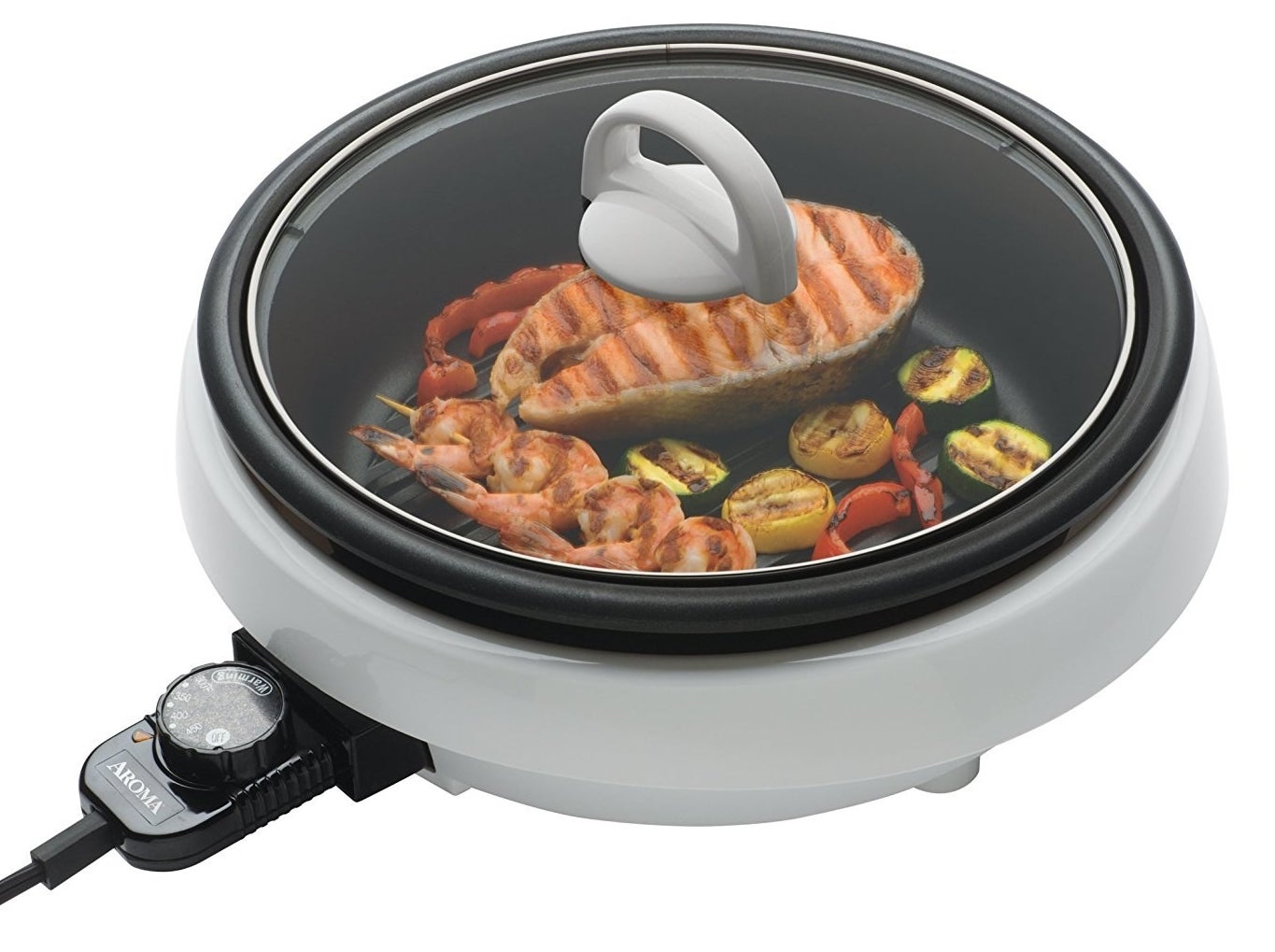 You can also use it for hosting shabu shabu/hotpot parties!Promising review: "Bought this to replace my stove. I can grill in it, fry fish, make soups, stews, and omelets, steam vegetables, and bake in it. I love it. It's easy on the electric bill and doesn't heat up the house." —William ThomasGet it from Amazon, Jet, or Walmart for $35.97.