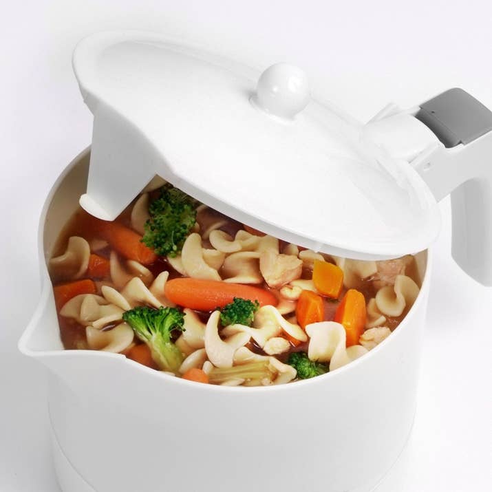 This 32 oz. kettle has an easy-clean non-stick heating and cooking surface, so don't worry about food getting stuck in there. It comes with an egg tray for making hardboiled eggs and a steamer tray for steaming veggies!Promising review: "My second one in six years! I love this little steamer for hot water, eggs, and steamed veggies! I've also prepared miso soups with veggies. It's also great to bring on a hotel stay that lacks basic kitchen items for families! (Breakfast or dinner in minutes for hungry little ones.)" —Amazon ShopperGet it from Amazon or Walmart for $12.95.