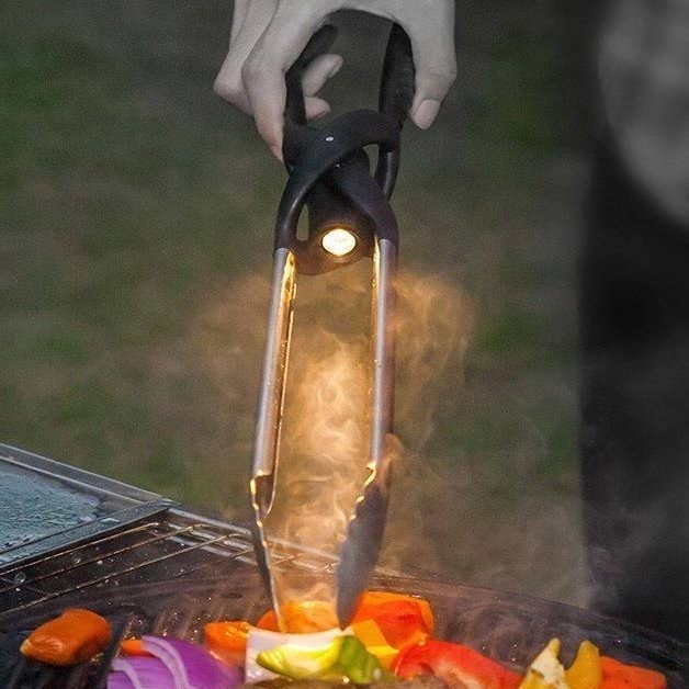 This tool includes extendable tongs, a spatula, a serrated knife, a removable flashlight, a bottle opener, and a grill scraper!Promising review: "It really is a great item! Our patio is a little dark towards the evening, and the little flashlight helps my father see better." —Amazon CustomerGet it from Amazon for $21.99, Jet for $22.99, or Walmart for $23.99.