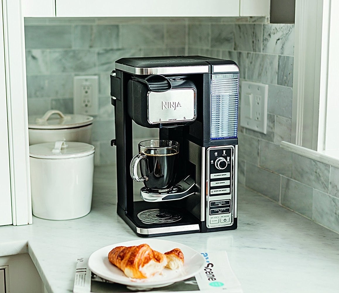 This coffee machine doesn't use pods, so you can use any kind of ground coffee!Promising review: "I love coffee and drink a lot of it. This machine is fantastic, one of the very few that can rival Nespresso. This Ninja makes amazing coffee. None of that sad watery, weak, or bitter brew, just rich flavorful coffee, even in the classic/regular setting. The rich setting produces a strong but also not bitter or burnt coffee. Yes, the machine takes a few minutes to warm up, but it brews fast. Love the way everything loads from the front, so I don't have to move it around to reach the water reservoir. Great machine, highly recommend it." —reader412Get it from Amazon for $82.99.