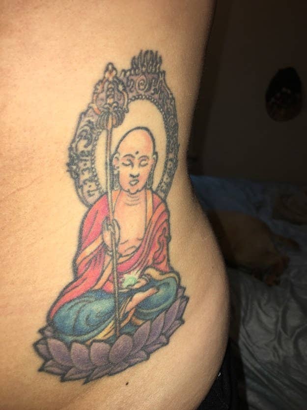 "I had a miscarriage when I was 19, which was incredibly hard to process for a long time. I’d never gotten a tattoo before, and I knew I wanted my first one to be meaningful. After a lot of research, I found the boddhisattva ksitigharba, guardian of the souls of children who died before their parents. The story goes that he keeps them safe until their parents also pass and they can enter heaven together. He’s also the protector of travelers, which is a bonus, since a couple years later I became a flight attendant. Now he watches over us both!" — sarif
