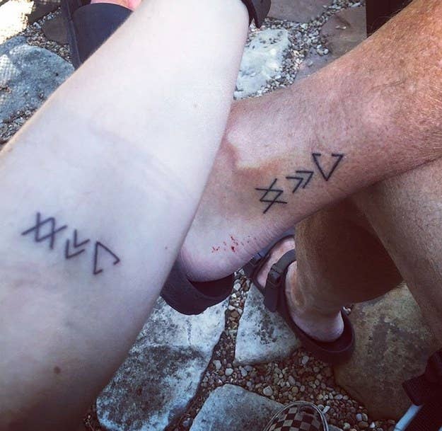 "Over the summer, my dad was diagnosed with terminal brain cancer and given just months to live. He drew three symbols on his ankle before he went into surgery and told me they mean 'be open to change', 'create your own destiny', and 'where there’s a will there’s a way'. When he started chemo, I took him to a tattoo parlour and got him his very first tattoo. He passed away last month a few days before I turned 21, but now I’ll always have a piece of him with me to give me some fatherly advice when I need it." — katew466be59dd