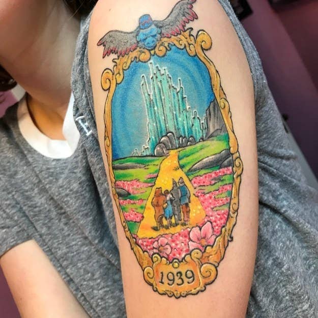 "For my 18th birthday I got my first tattoo of The Wizard of Oz. It’s been my favourite movie my whole life because it was my grandma’s favourite. I always saw myself as a mini her; both artists, singers, actresses, etc. She died when I was 11 and I wanted to memorialise her with art from our favourite musical. 1939 is the year the movie came out and one year after she was born." — kateg43248ff43