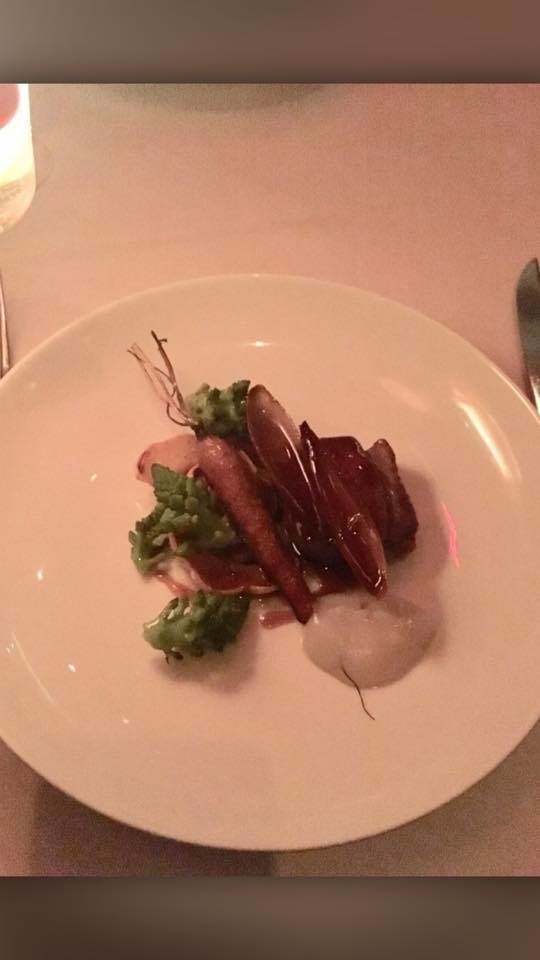 The entree option ranges from seafood (salmon, cod, halibut) to meat (chicken, veal chop, steak). The roasted lamb loin in sage sauce is served with a side of seasonal vegetables, sunchokes, and shallots.