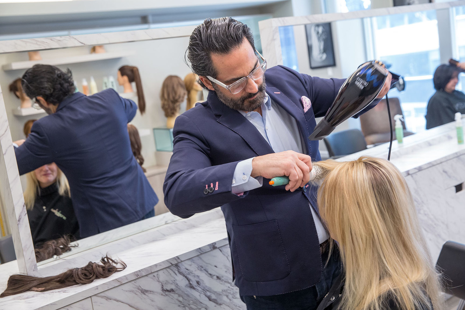 A hair extension leader, Angelo David has spent years developing Couture Hair, which is created in the salon through a highly personalized process, using the finest-quality human hair. The Couture Hair line meets every possible hair need and want. From full custom, human-hair wigs and luxurious, custom extensions to additions and Clip-on ponytails, each of our Couture Hair products is designed for a specific desire and lifestyle, but all share the same premium quality and personalized attention to detail. With Angelo David Couture Hair, you can have the hair you always wanted.