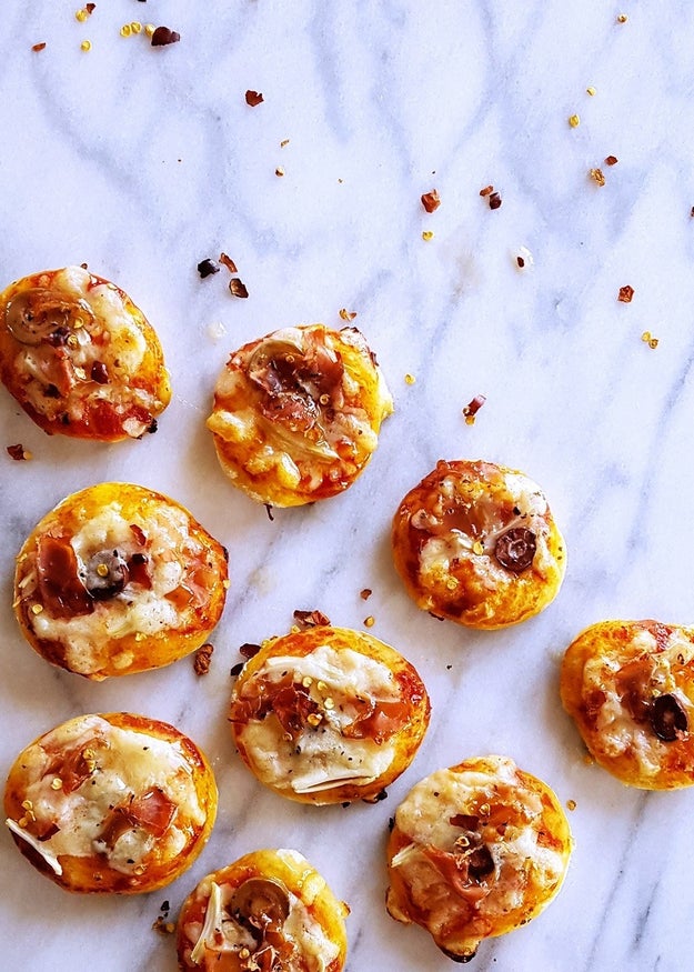 Mini Prosciutto, Olive, and Fennel Pizza Bites with Drizzled Honey