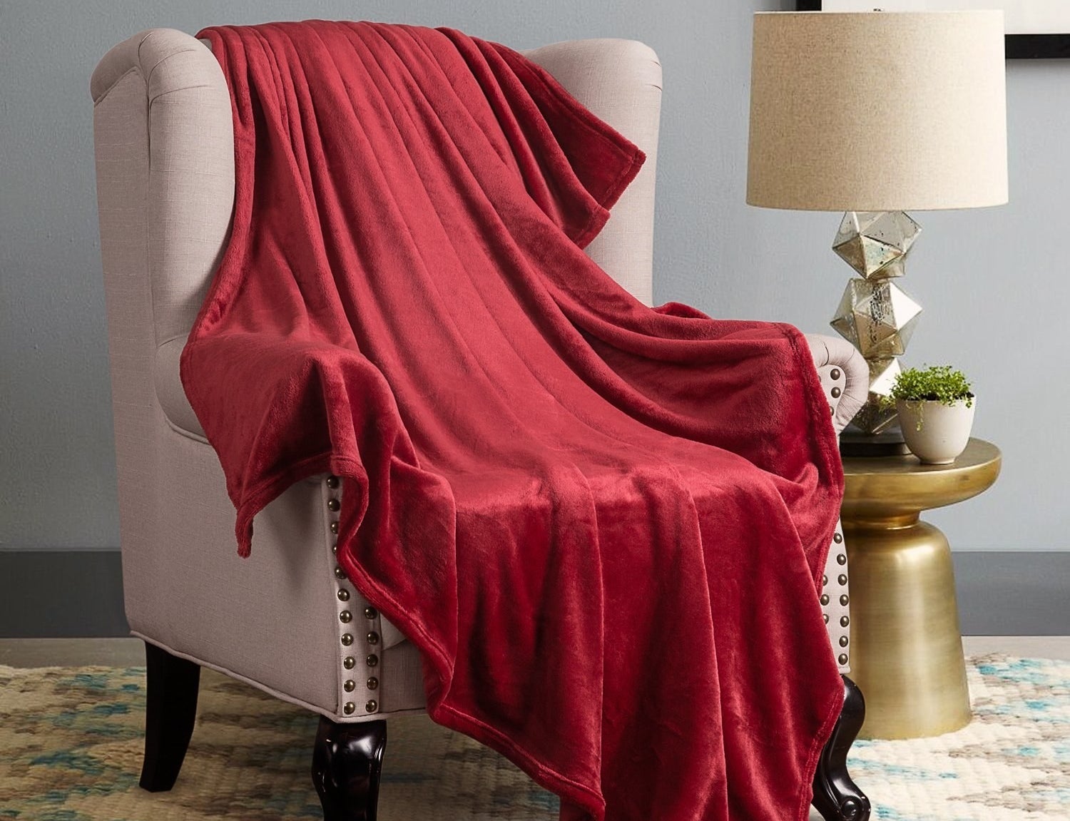 Promising review: "I actually really love this blanket. I originally bought it to have on my couch, but now I want to buy more. It is a lot lighter than I thought it would be, but still warm. It is SOOOO soft. SO SOFT. A lot softer than expected. I want to keep petting it. I will be buying more soon, maybe in a bigger size." —PrimeMeBaby1MoreTimePrice: $15.49+ (available in 15 colors, four sizes)