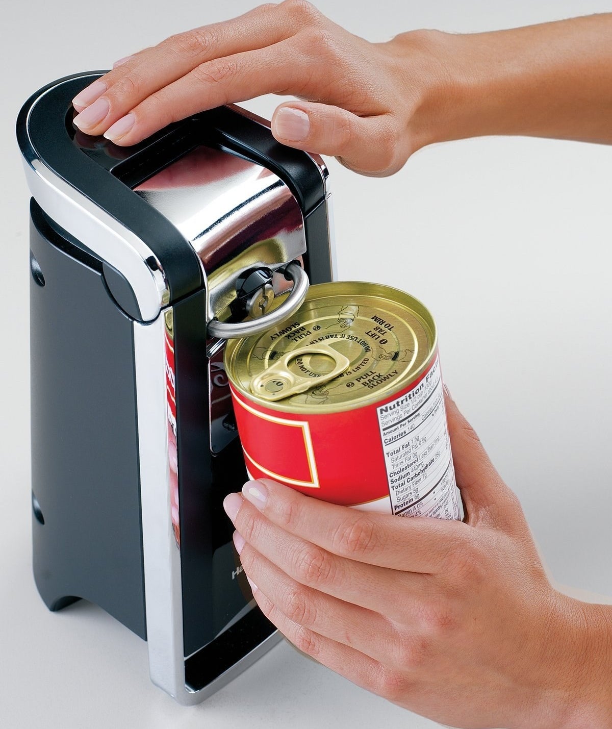 Promising review: "I'm very happy with this can opener. I don't know why I didn't get this sooner. It actually makes opening cans fun. Weird, I know. It effortlessly spins the can and LOCKS it in place so you don't have to worry about it falling off and going everywhere when the lid comes off. That's another thing, the LID comes off, not a huge gouge in the top of it. I don't know how it does it, but it literally pops off the top as if it was from the factory. I'm very happy with this, and I know you will be too. This is 100% worth it." —MikePrice: $29.92