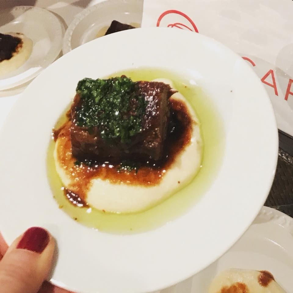 Melt-in-your-mouth short ribs braised in red wine with creamy parsnip puree and meyer lemon gremolata