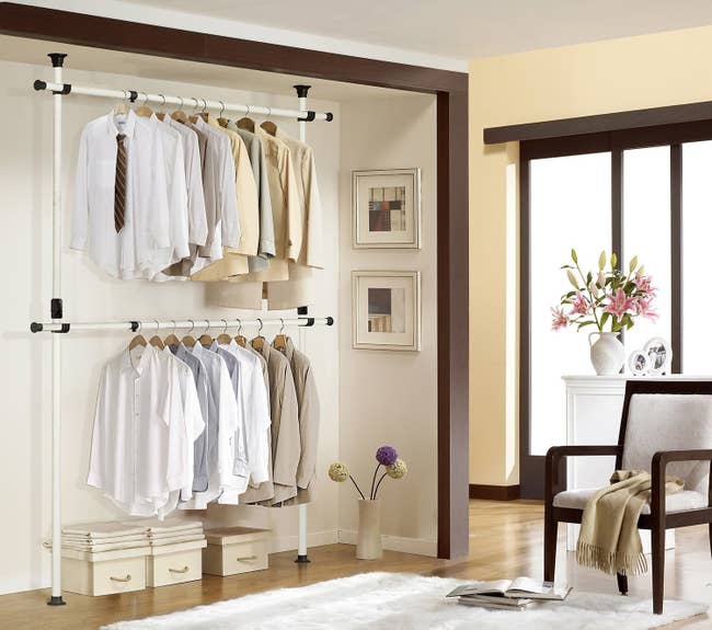 A closet with the adjustable clothes rack installed