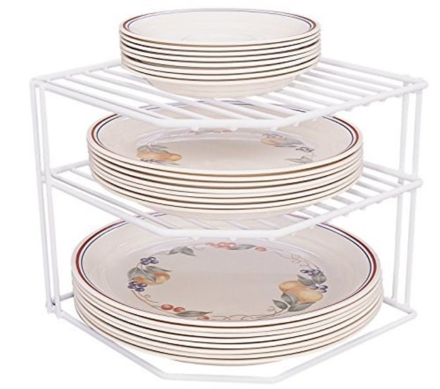A corner organizer for plates to maximize storage space.