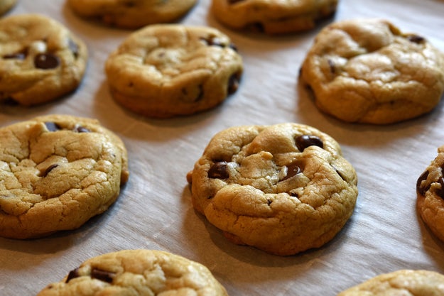 And spray the baking sheet with a little bit of water to help parchment paper stick to it.