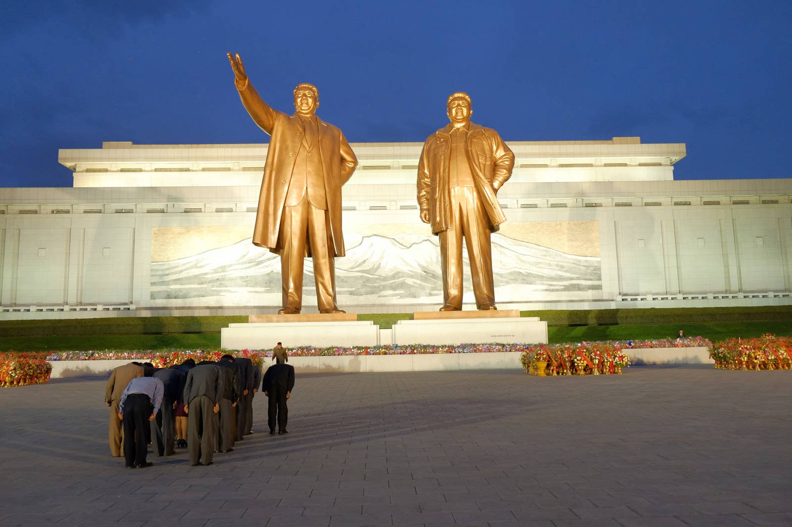 North Koreans pay their respects at the Mansudae Grand monument in Pyongyang.