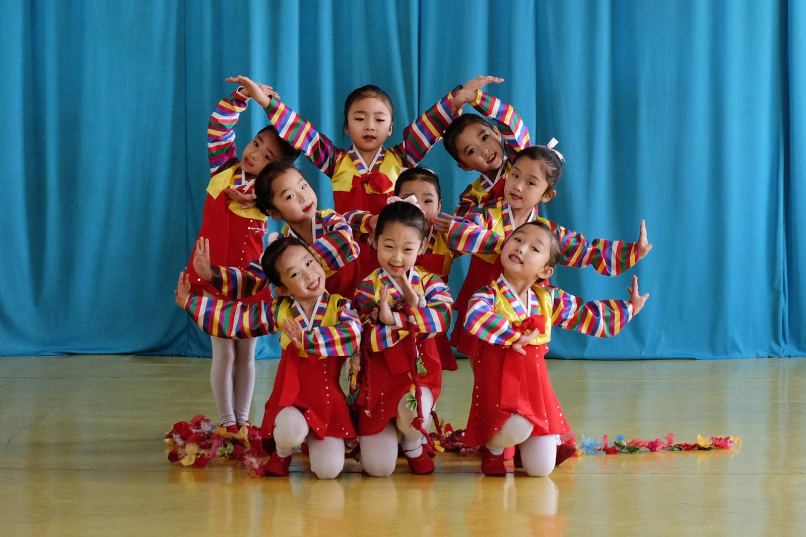 Young girls perform at a kindergarten in Chongjin.